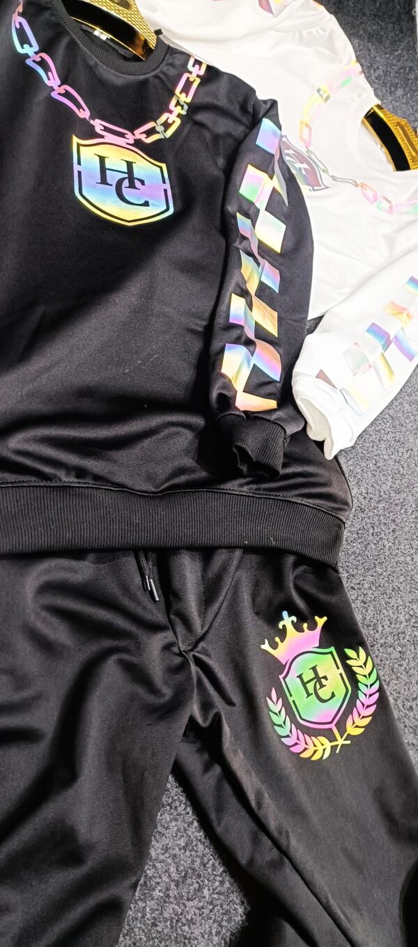 Imported reflecter track suit.imp king Roma softy fabric free size . black and white
